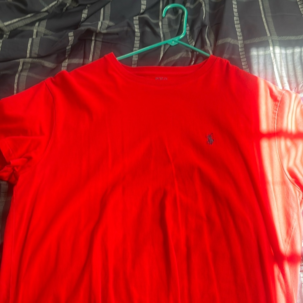 Men’s red polo T-shirt for sale. Size medium.